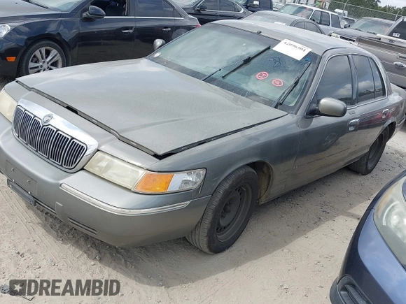 1999 Mercury Grand Marquis GS z VIN 2MEFM74W4XX631219, wystawiony jako IAAI lot #42096304 z przebiegiem 267 738 mil mil oraz . Historia ofert i sprzedaży dostępna na DreamBid. Obrazek 2.