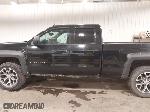 2014 Chevrolet Silverado 1500 LT with VIN 1GCVKREH2EZ225509, listed as a IAAI auction lot 41728865 with 257,709 mi miles and . Bid and sale history available at DreamBid. Image 14.