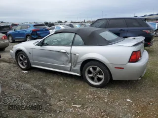 1999 Ford Mustang GT with VIN 1FAFP45X0XF234431, listed as a Copart auction lot 47402055 with 105,861 mi miles and Salvage title. Bid and sale history available at DreamBid. Image 2.