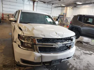 2018 Chevrolet Tahoe Commercial with VIN 1GNSKDEC7JR240082, listed as a IAAI auction lot 41608557 with 111,834 mi miles. Bid and sale history available at carsss.com. Image 12.
