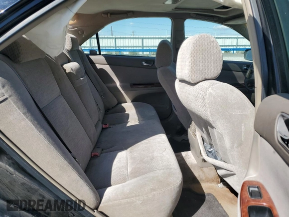 2002 Toyota Camry XLE z VIN 4T1BF30K12U020467, wystawiony jako Copart lot #54628995 z przebiegiem 222 898 mil mil oraz Szkoda całkowita • Salvage title. Historia ofert i sprzedaży dostępna na DreamBid. Obrazek 11.