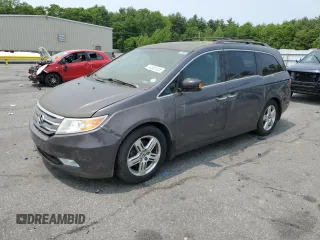 2013 Honda Odyssey Touring с VIN 5FNRL5H98DB053891, выставлен на аукционе Copart как лот 59592425 с пробегом 174 773 миль миль и Чистый • Clean title. История ставок и продаж доступна на DreamBid. Изображение 1.