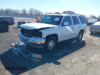 2003 GMC Yukon SLT with VIN 1GKEC13Z13J197955, listed as a IAAI auction lot 41586841 with 208,752 mi miles. Bid and sale history available at carsss.com. Image 22.