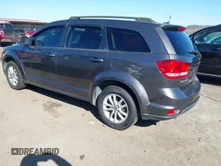 2014 Dodge Journey SXT with VIN 3C4PDCBG6ET192288, listed as a IAAI auction lot 41787594 with 132,973 mi miles. Bid and sale history available at carsss.com. Image 3.