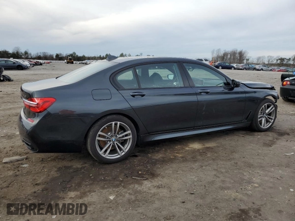 2019 BMW 7 Series 740i xDrive with VIN WBA7E4C51KGV70031, listed as a Copart auction lot 38008974 with 33,555 mi miles and . Bid and sale history available at DreamBid. Image 3.