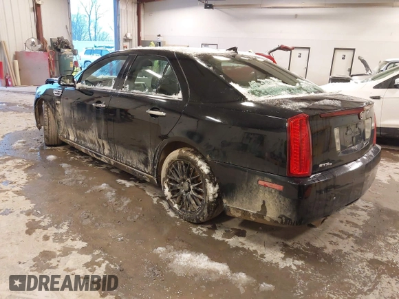 2010 Cadillac STS AWD with VIN 1G6DU6EV2A0125065, listed as a IAAI auction lot 41229886 with 84,954 mi miles and . Bid and sale history available at DreamBid. Image 3.