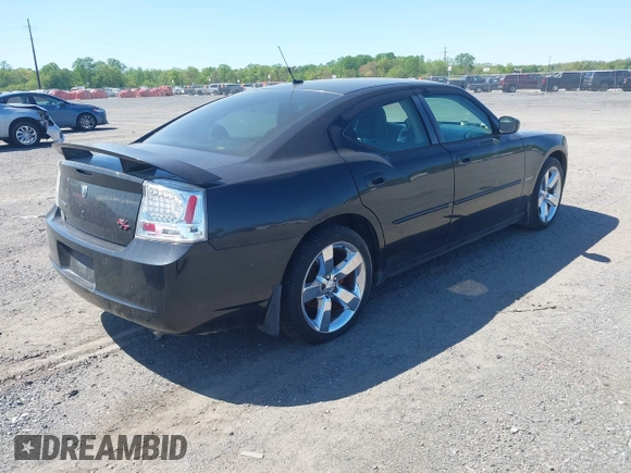 2008 Dodge Charger R/T with VIN 2B3LA53H18H257735, listed as a IAAI auction lot 42136677 with 224,754 mi miles and . Bid and sale history available at carsss.com. Image 4.