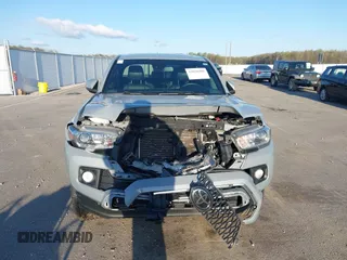 2018 Toyota Tacoma SR5 with VIN 3TMDZ5BN3JM054548, listed as a IAAI auction lot 42038480 with 122,242 mi miles and . Bid and sale history available at DreamBid. Image 12.