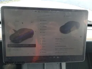 2024 Tesla Model Y Long Range с VIN 7SAYGDEE8RA270862, выставлен на аукционе Copart как лот 58099875 с пробегом 24 856 миль миль и На запчасти • Non repairable. История ставок и продаж доступна на DreamBid. Изображение 9.