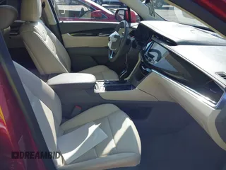 2021 Cadillac XT6 Premium Luxury z VIN 1GYKPCRS1MZ114854, wystawiony jako IAAI lot #41205686 z przebiegiem 27 347 mil mil oraz . Historia ofert i sprzedaży dostępna na DreamBid. Obrazek 5.