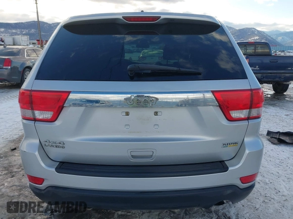 2011 Jeep Grand Cherokee Laredo with VIN 1J4RR4GG7BC584500, listed as a IAAI auction lot 41383355 with 161,722 mi miles. Bid and sale history available at carsss.com. Image 16.