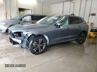 2018 Volvo XC60 Momentum z VIN LYVA22RK4JB078297, wystawiony jako Copart lot #53811245 z przebiegiem 55 093 mil mil oraz Szkoda całkowita • Salvage title. Historia ofert i sprzedaży dostępna na DreamBid. Obrazek 1.