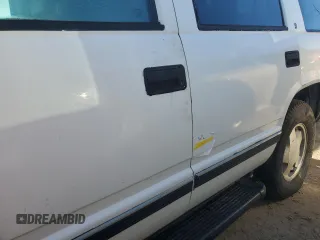 1998 GMC Yukon with VIN 1GKEK13R9WJ711087, listed as a Copart auction lot 73795594 with 177,708 mi miles and Non Repairable. Bid and sale history available at carsss.com. Image 13.