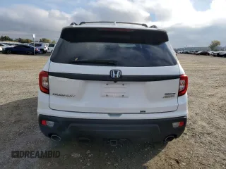 2020 Honda Passport Touring z VIN 5FNYF8H9XLB016652, wystawiony jako Copart lot #80346824 z przebiegiem 81 680 mil mil oraz Szkoda całkowita • Salvage title. Historia ofert i sprzedaży dostępna na DreamBid. Obrazek 6.