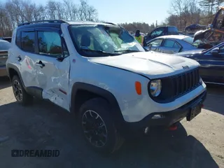 2023 Jeep Renegade Trailhawk z VIN ZACNJDC13PPP40710, wystawiony jako IAAI lot #41744475 z przebiegiem 17 057 mil mil oraz . Historia ofert i sprzedaży dostępna na DreamBid. Obrazek 1.