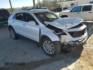 2021 Cadillac XT4 FWD Luxury с VIN 1GYAZAR47MF023407, выставлен на аукционе Copart как лот 88633325 с пробегом 77 353 миль миль и Списание • Salvage title. История ставок и продаж доступна на DreamBid. Изображение 4.