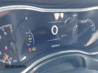 2015 Jeep Grand Cherokee Summit with VIN 1C4RJFJGXFC125131, listed as a IAAI auction lot 42475017 with 128,166 mi miles and . Bid and sale history available at DreamBid. Image 7.