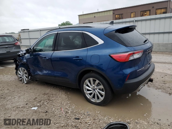 2022 Ford Escape Titanium с VIN 1FMCU9J95NUB64746, выставлен на аукционе Copart как лот 57643815 с пробегом 32 476 миль миль и Списание • Salvage title. История ставок и продаж доступна на DreamBid. Изображение 2.