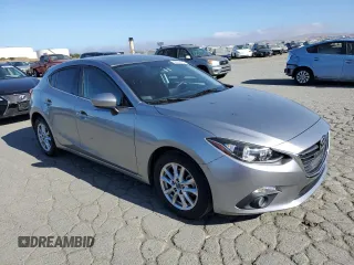 2015 Mazda 3 i Grand Touring z VIN JM1BM1M70F1260802, wystawiony jako Copart lot #60662705 z przebiegiem 89 974 mil mil oraz Szkoda całkowita • Salvage title. Historia ofert i sprzedaży dostępna na DreamBid. Obrazek 4.