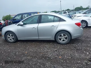 2014 Chevrolet Cruze 1LT with VIN 1G1PC5SB4E7153697, listed as a IAAI auction lot 42682055 with 273,905 mi miles and . Bid and sale history available at DreamBid. Image 14.