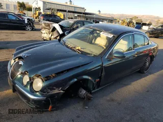 2003 Jaguar S-Type with VIN SAJEA01U73HM48330, listed as a Copart auction lot 80128574 with Not Provided miles and Salvage Title. Bid and sale history available at DreamBid. Image 1.