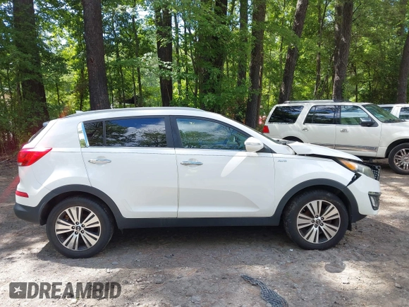 2014 Kia Sportage EX with VIN KNDPCCAC5E7658993, listed as a IAAI auction lot 42679549 with 107,658 mi miles and . Bid and sale history available at DreamBid. Image 13.