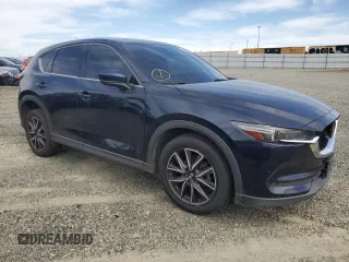2017 Mazda CX-5 Grand Touring with VIN JM3KFADL2H0221149, listed as a Copart auction lot 50606915 with 140,518 mi miles and Clean Title. Bid and sale history available at carsss.com. Image 4.