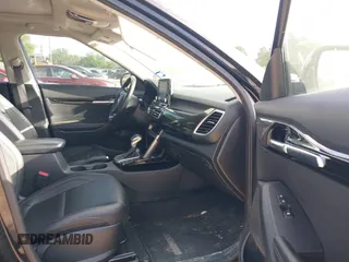 2021 Kia Seltos EX with VIN KNDERCAAXM7228380, listed as a IAAI auction lot 42015912 with 61,612 mi miles. Bid and sale history available at carsss.com. Image 5.