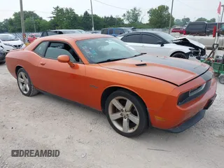 2011 Dodge Challenger z VIN 2B3CJ4DGXBH561735, wystawiony jako IAAI lot #42506888 z przebiegiem 103 493 mil mil oraz . Historia ofert i sprzedaży dostępna na DreamBid. Obrazek 1.