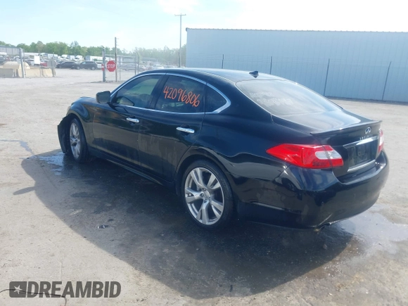 2013 Infiniti M with VIN JN1AY1AR6DM590187, listed as a IAAI auction lot 42096806 with 182,909 mi miles and . Bid and sale history available at DreamBid. Image 3.
