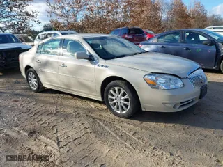 2011 Buick Lucerne CX with VIN 1G4HA5EM9BU144114, listed as a IAAI auction lot 41640298 with 128,509 mi miles. Bid and sale history available at carsss.com. Image 1.