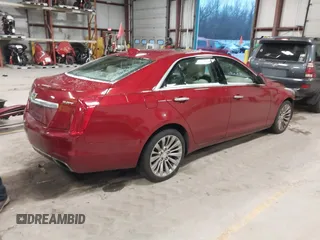 2016 Cadillac CTS Luxury Collection AWD z VIN 1G6AX5SX6G0124584, wystawiony jako IAAI lot #41235515 z przebiegiem 82 286 mil mil oraz . Historia ofert i sprzedaży dostępna na DreamBid. Obrazek 4.