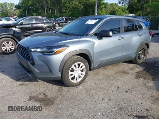 2023 Toyota Corolla Cross L with VIN 7MUAAAAG4PV044969, listed as a IAAI auction lot 42388727 with 26,071 mi miles and . Bid and sale history available at DreamBid. Image 2.