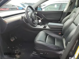 2022 Tesla Model Y Long Range with VIN 7SAYGDEE7NF386082, listed as a Copart auction lot 47191625 with 73,634 mi miles and Salvage Title. Bid and sale history available at carsss.com. Image 7.