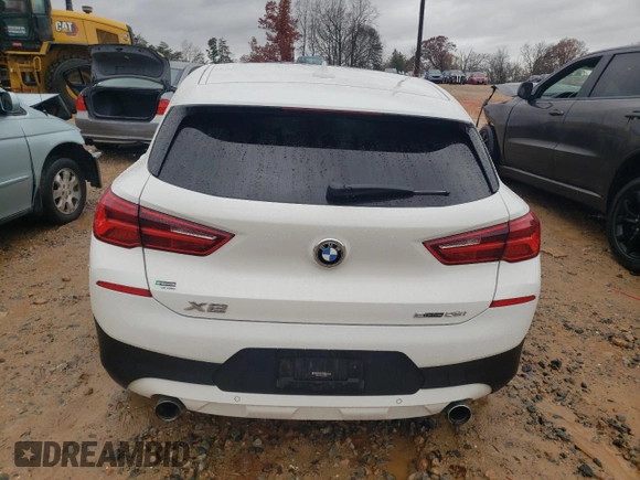 2020 BMW X2 sDrive28i with VIN WBXYH9C08L5P33368, listed as a Copart auction lot 69129512 with 66,918 mi miles. Bid and sale history available at carsss.com. Image 6.
