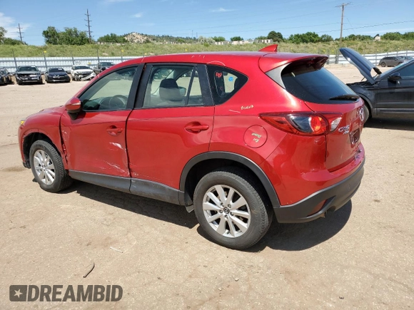 2016 Mazda CX-5 Sport with VIN JM3KE4BYXG0702655, listed as a Copart auction lot 63120205 with 64,403 mi miles and Salvage title. Bid and sale history available at DreamBid. Image 2.