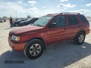 2001 Isuzu Rodeo S z VIN 4S2CK58W414317422, wystawiony jako Copart lot #75123154 z przebiegiem Nie podano mil oraz Szkody całkowita. Historia ofert i sprzedaży dostępna na DreamBid. Obrazek 1.