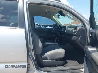 2018 Toyota Tacoma SR with VIN 3TMCZ5AN2JM172829, listed as a IAAI auction lot 42073847 with 136,671 mi miles and . Bid and sale history available at carsss.com. Image 5.