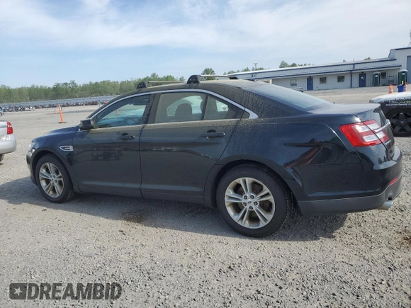 2014 Ford Taurus SEL with VIN 1FAHP2E87EG151866, listed as a Copart auction lot 52692965 with 201,680 mi miles and Clean Title. Bid and sale history available at DreamBid. Image 2.