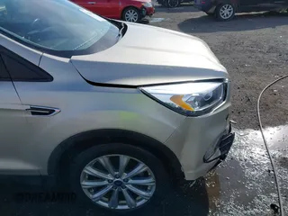 2017 Ford Escape Titanium with VIN 1FMCU0JD3HUB19602, listed as a IAAI auction lot 41816296 with 70,311 mi miles. Bid and sale history available at carsss.com. Image 18.