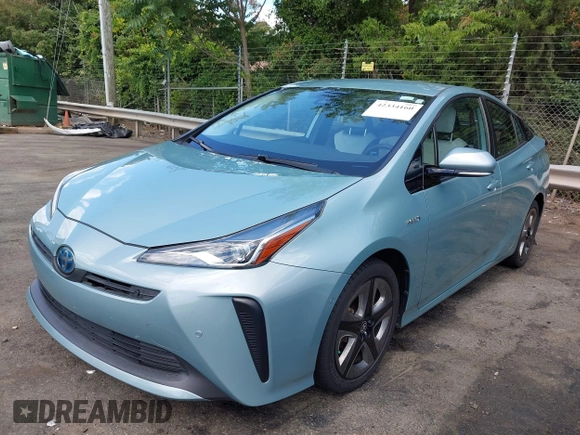 2019 Toyota Prius L Eco z VIN JTDKARFU8K3095669, wystawiony jako IAAI lot #42334160 z przebiegiem 59 882 mil mil oraz . Historia ofert i sprzedaży dostępna na DreamBid. Obrazek 2.
