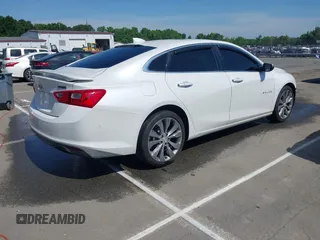 2016 Chevrolet Malibu Premier with VIN 1G1ZH5SX6GF265089, listed as a IAAI auction lot 42148876 with 127,497 mi miles and . Bid and sale history available at DreamBid. Image 4.