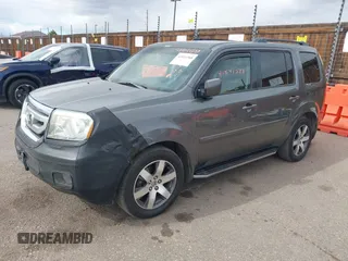 2011 Honda Pilot EX-L with VIN 5FNYF4H65BB066162, listed as a IAAI auction lot 41841588 with 387,036 mi miles and . Bid and sale history available at carsss.com. Image 17.