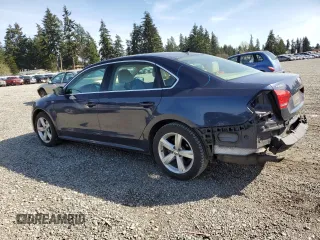 2014 Volkswagen Passat Wolfsburg Edition z VIN 1VWAT7A32EC036093, wystawiony jako Copart lot #52129185 z przebiegiem 106 949 mil mil oraz Szkoda całkowita • Salvage title. Historia ofert i sprzedaży dostępna na DreamBid. Obrazek 2.