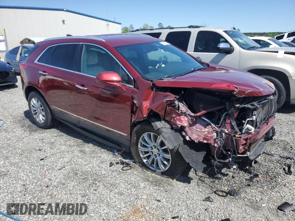 2018 Cadillac XT5 FWD with VIN 1GYKNARS1JZ205595, listed as a Copart auction lot 52428565 with 106,927 mi miles and Salvage title. Bid and sale history available at DreamBid. Image 4.