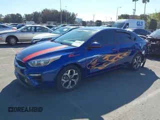 2021 Kia Forte FE with VIN 3KPF24AD7ME268764, listed as a IAAI auction lot 41658001 with 128,080 mi miles. Bid and sale history available at carsss.com. Image 2.