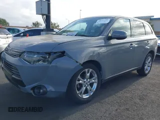 2014 Mitsubishi Outlander SE z VIN JA4AD3A37EZ011335, wystawiony jako IAAI lot #42115343 z przebiegiem 129 159 mil mil oraz . Historia ofert i sprzedaży dostępna na DreamBid. Obrazek 2.