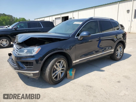 2015 Volkswagen Touareg Lux z VIN WVGEP9BP2FD006802, wystawiony jako Copart lot #52291965 z przebiegiem 122 787 mil mil oraz Szkoda całkowita • Salvage title. Historia ofert i sprzedaży dostępna na DreamBid. Obrazek 1.