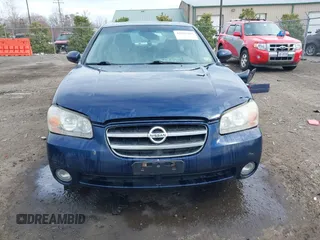 2003 Nissan Maxima GLE z VIN JN1DA31A03T412514, wystawiony jako IAAI lot #41856102 z przebiegiem 156 832 mil mil oraz . Historia ofert i sprzedaży dostępna na DreamBid. Obrazek 13.