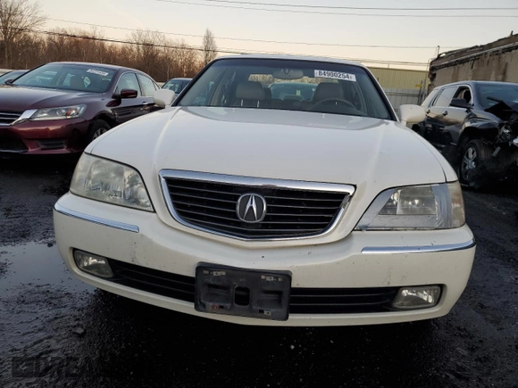 2004 Acura RL w/Navigation System with VIN JH4KA966X4C001987, listed as a Copart auction lot 84900254 with 151,465 mi miles and Clean Title. Bid and sale history available at carsss.com. Image 5.